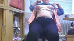 Office girl teases in her office